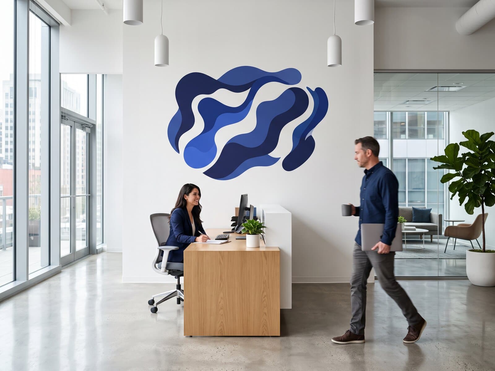Bright office reception with a flowing abstract mural in navy and cobalt floating at the center of the wall behind the front desk